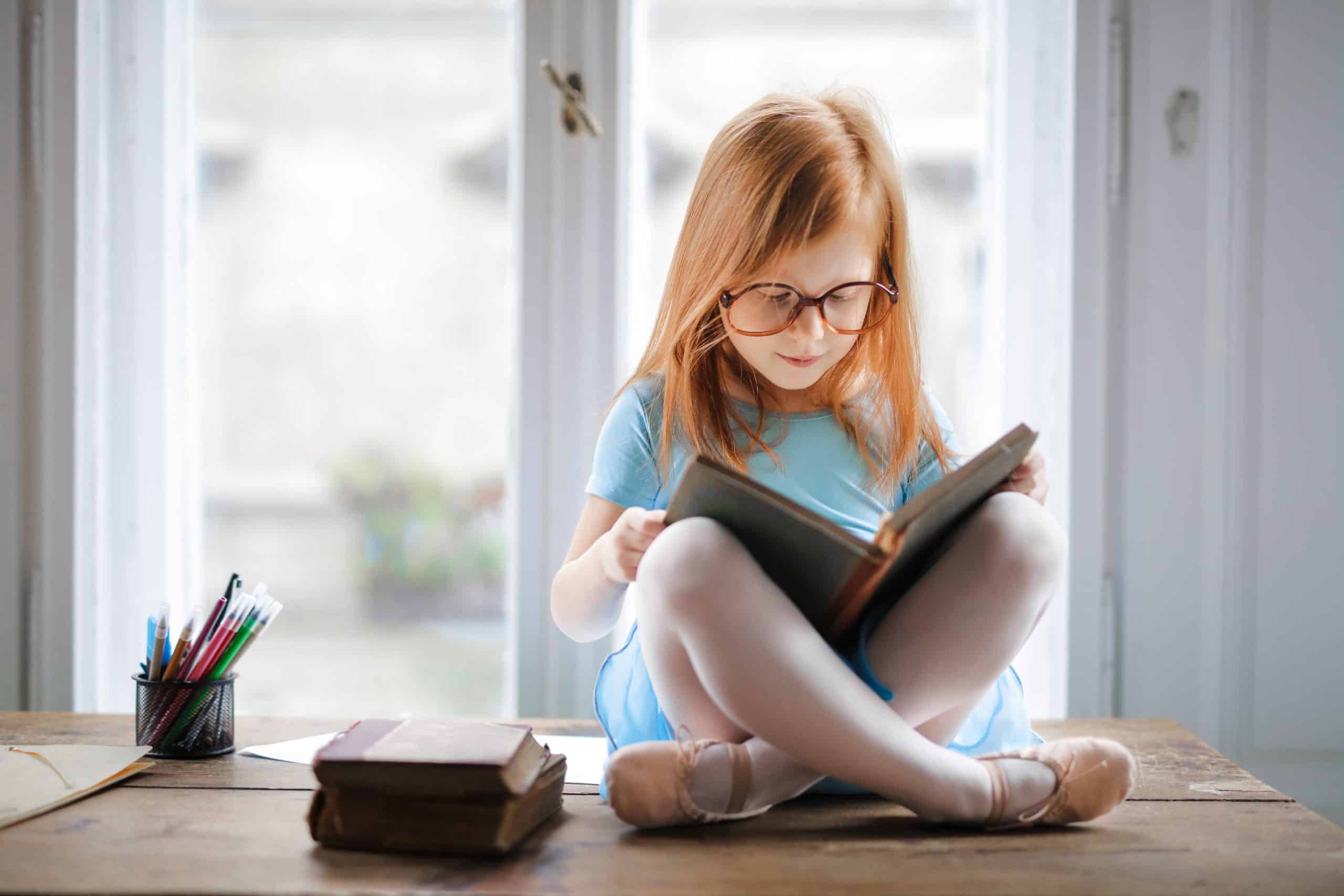 photo of girl reading book 3755707